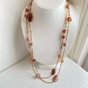Station necklace with seed beads faux pearls and swirly acrylic ovals continuous